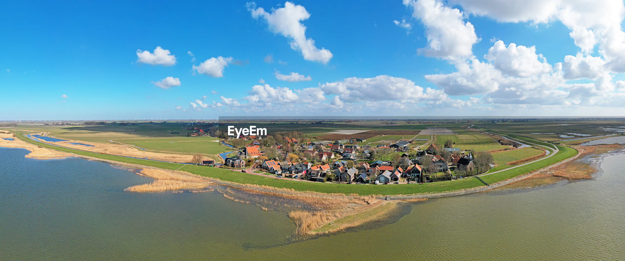 Aerial panorama from the village gaast at the ijsselmeer in the netherlands