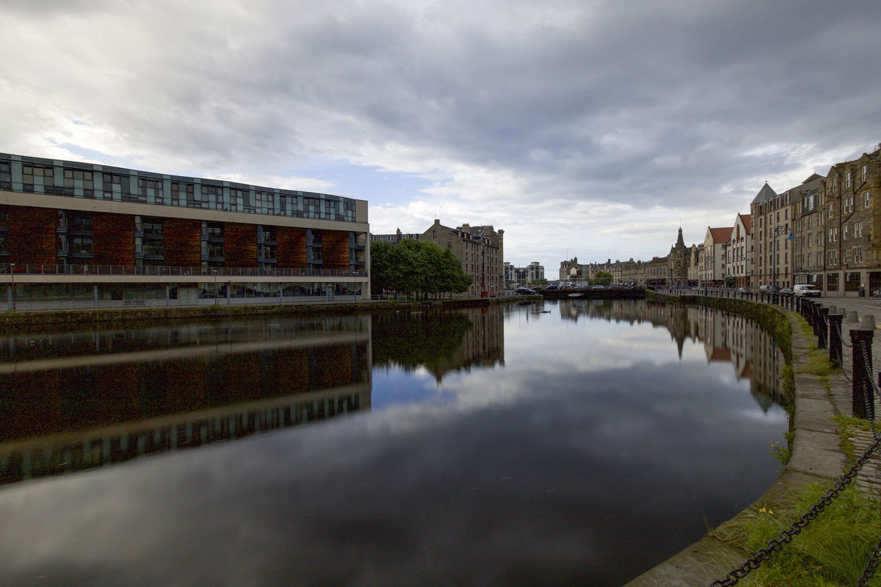 REFLECTION OF BUILDINGS IN WATER