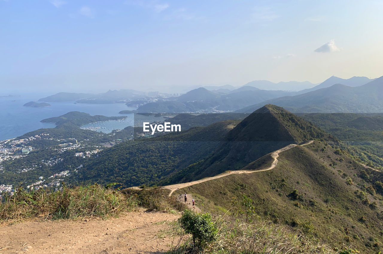 Winding trails on the mountain range, wan kuk shan and ma on shan, in sai kung,  against sky