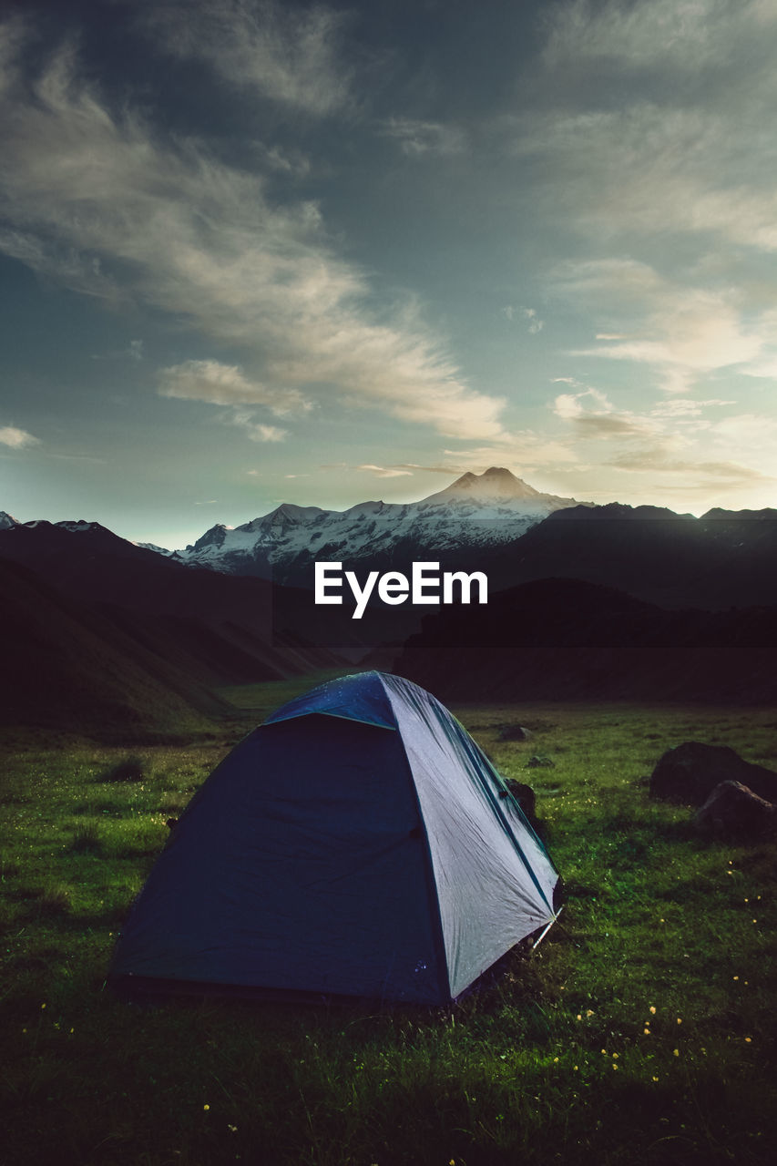 Tent on land against sky