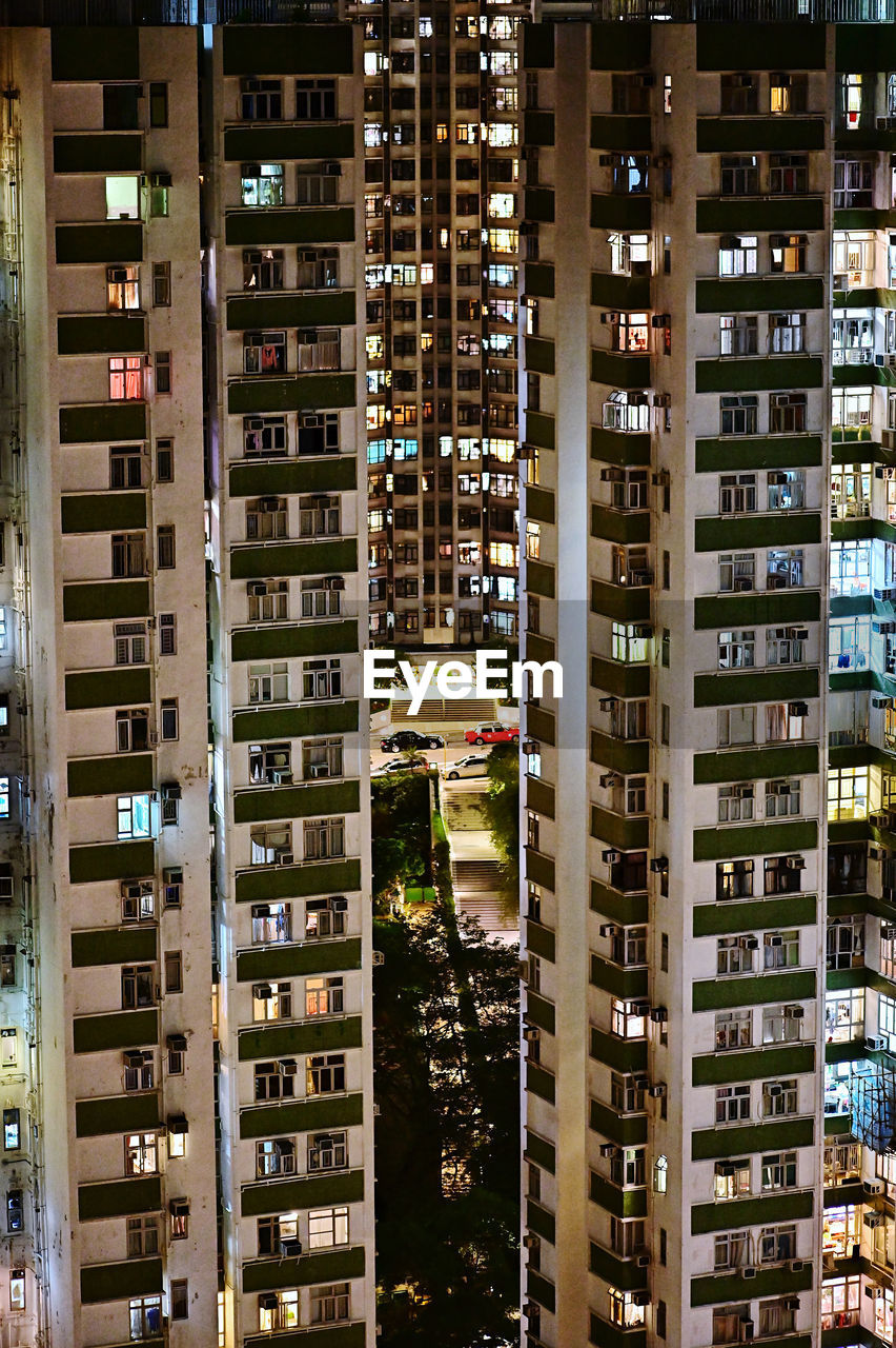 Buildings in city at night