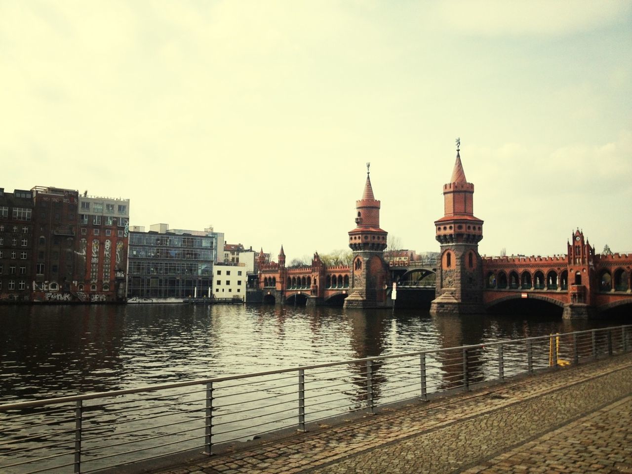 Oberbaum bridge over river against sky