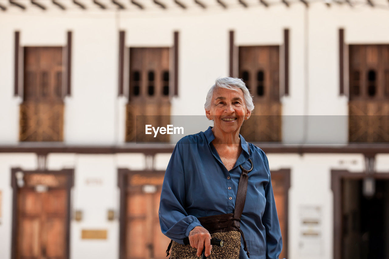 Senior woman tourist at the heritage town of salamina in the department of caldas in colombia