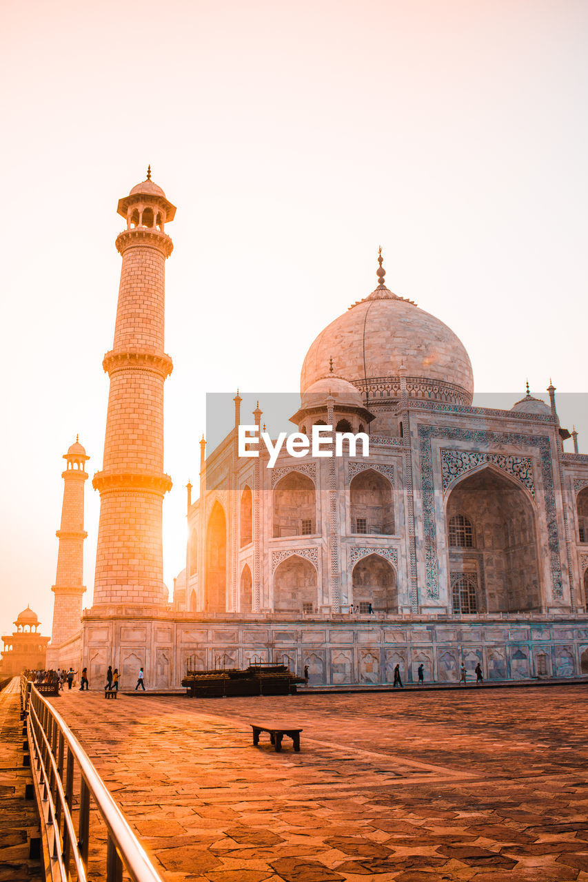 Taj mahal against sky during sunset