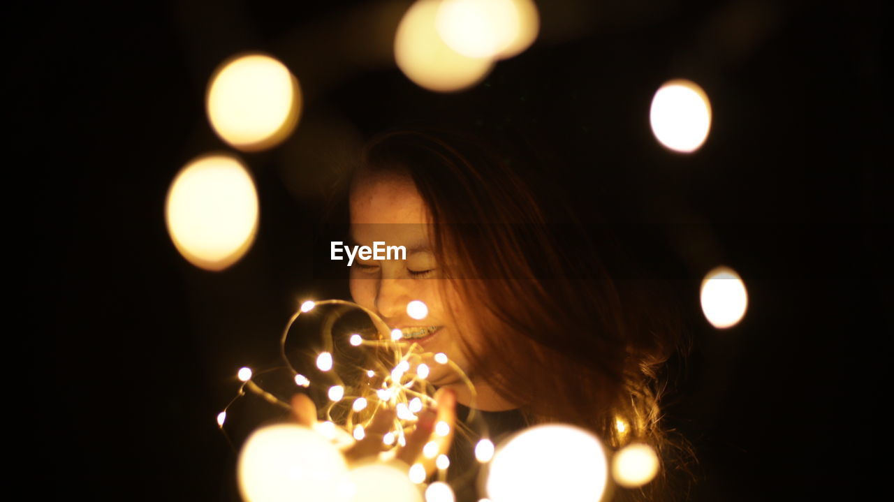 close-up of illuminated string lights at night