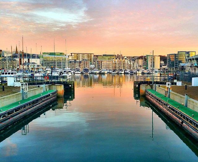 VIEW OF HARBOR AT SUNSET