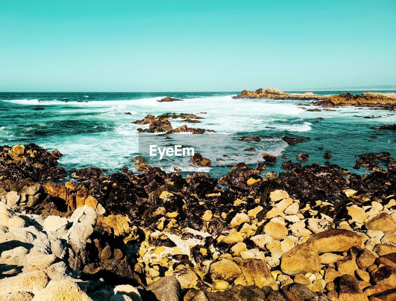 Scenic view of sea against clear sky