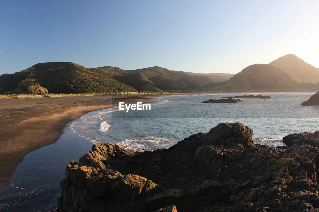 Scenic view of sea against clear sky