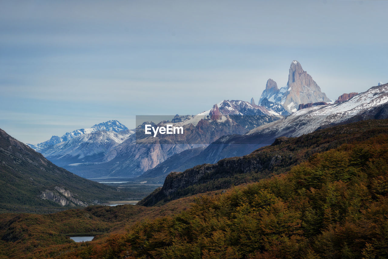 Scenic view of snowcapped mountains against sky