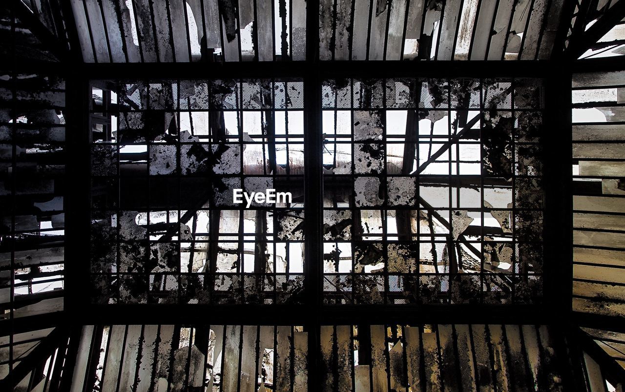 Broken glass ceiling of abandoned building