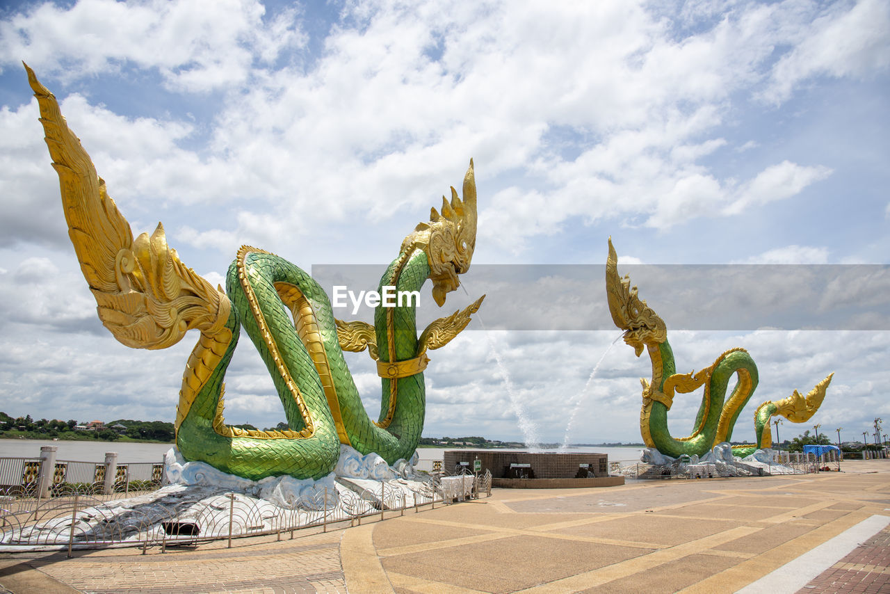 Twin green naga statue at the mekong river, wat lamduan temple, nong khai province thailand.