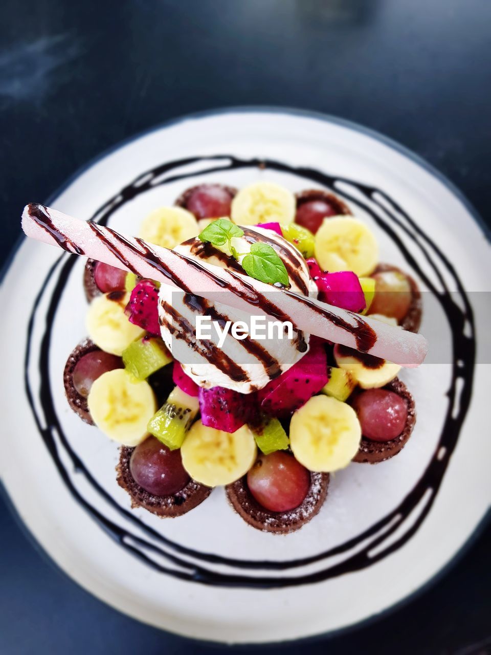 High angle view of fruits in plate on table