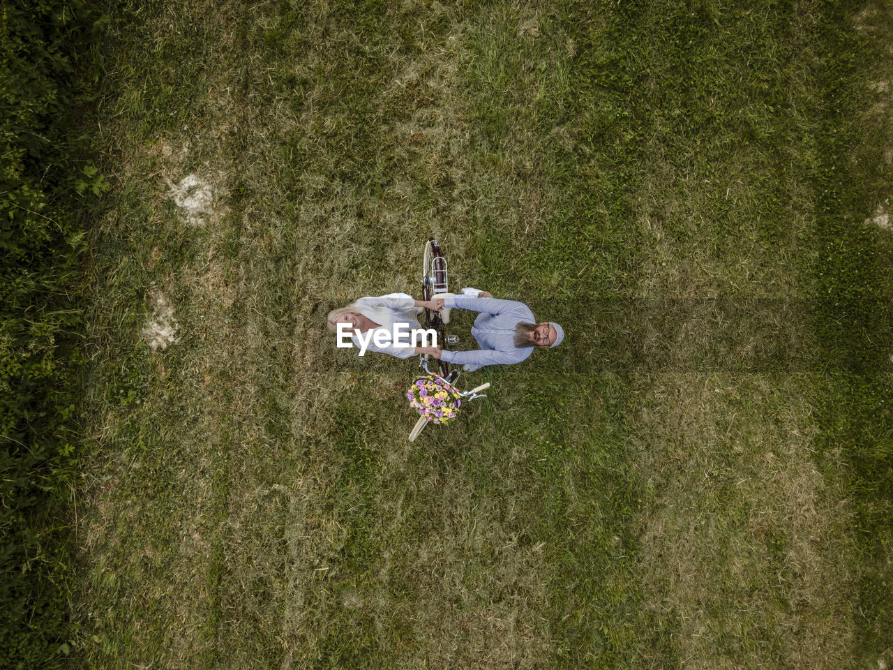 High angle view of people on grass