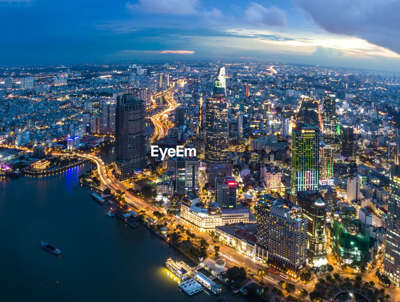 High angle view of illuminated city buildings at night