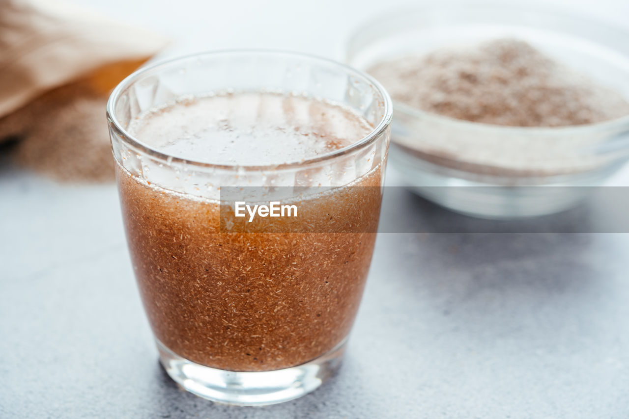 A glass of water soluble psyllium husk dietary fiber supplement, healthy diet morning routine