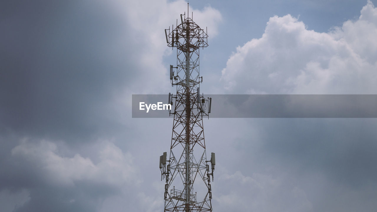 LOW ANGLE VIEW OF TELEPHONE POLE AGAINST SKY