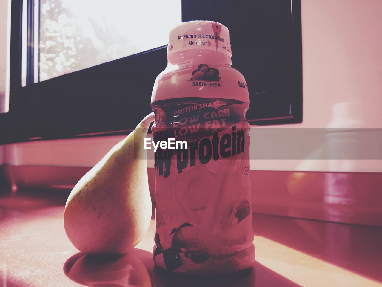 Close-up of drink bottle on table