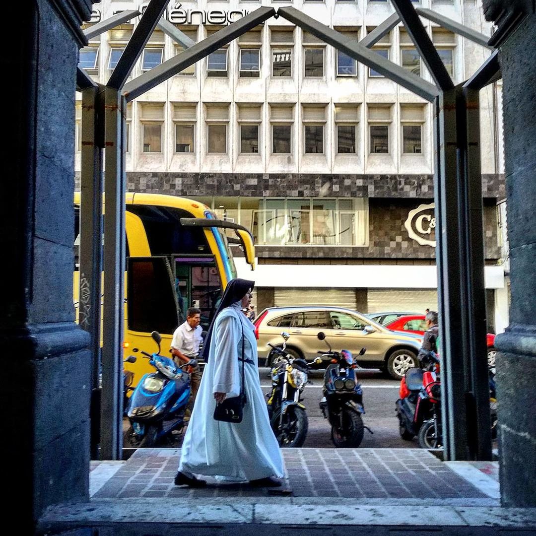 VIEW OF YELLOW CART ON STREET