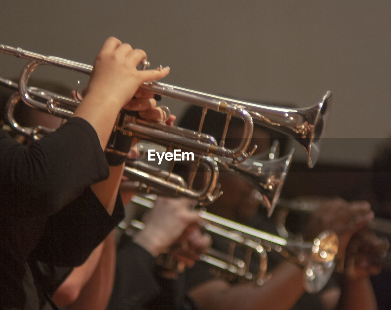 MIDSECTION OF MAN PLAYING MUSIC CONCERT