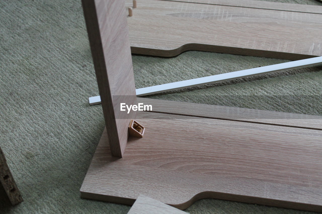 furniture, wood, table, high angle view, indoors, no people, floor, plywood, flooring, wing, architecture