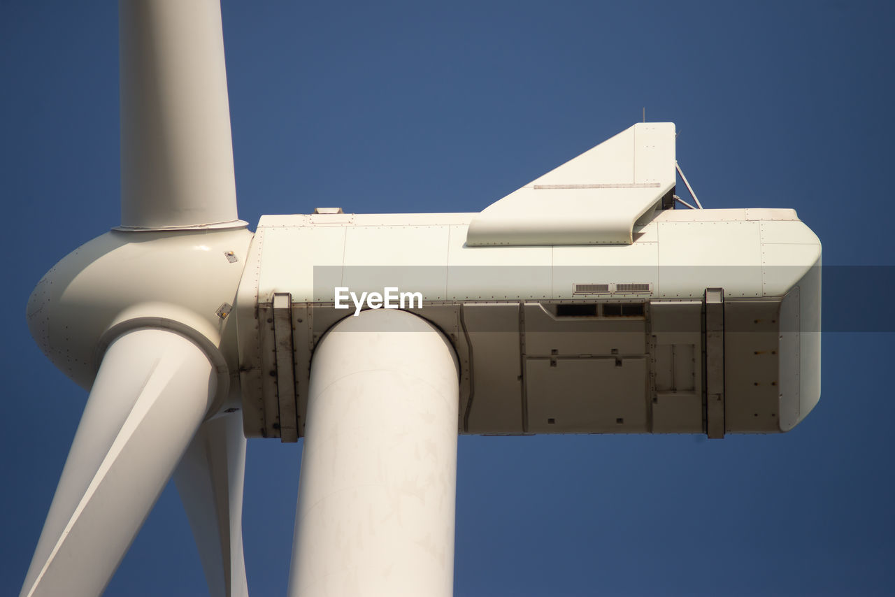 Wind power turbines facilities in futureland man-made island as a part of rotterdam port