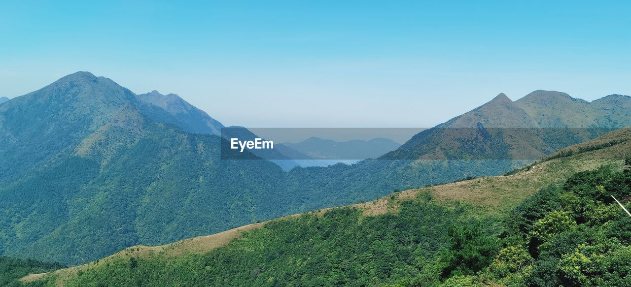 PANORAMIC VIEW OF MOUNTAINS AGAINST SKY