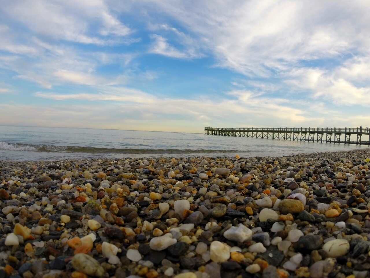 Colorful pebbles on sea shore