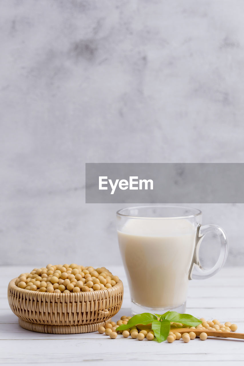 CLOSE-UP OF BREAKFAST ON TABLE AGAINST WALL