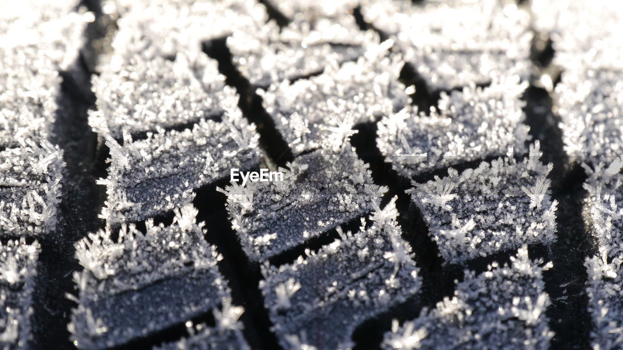 Full frame shot of frosted tire