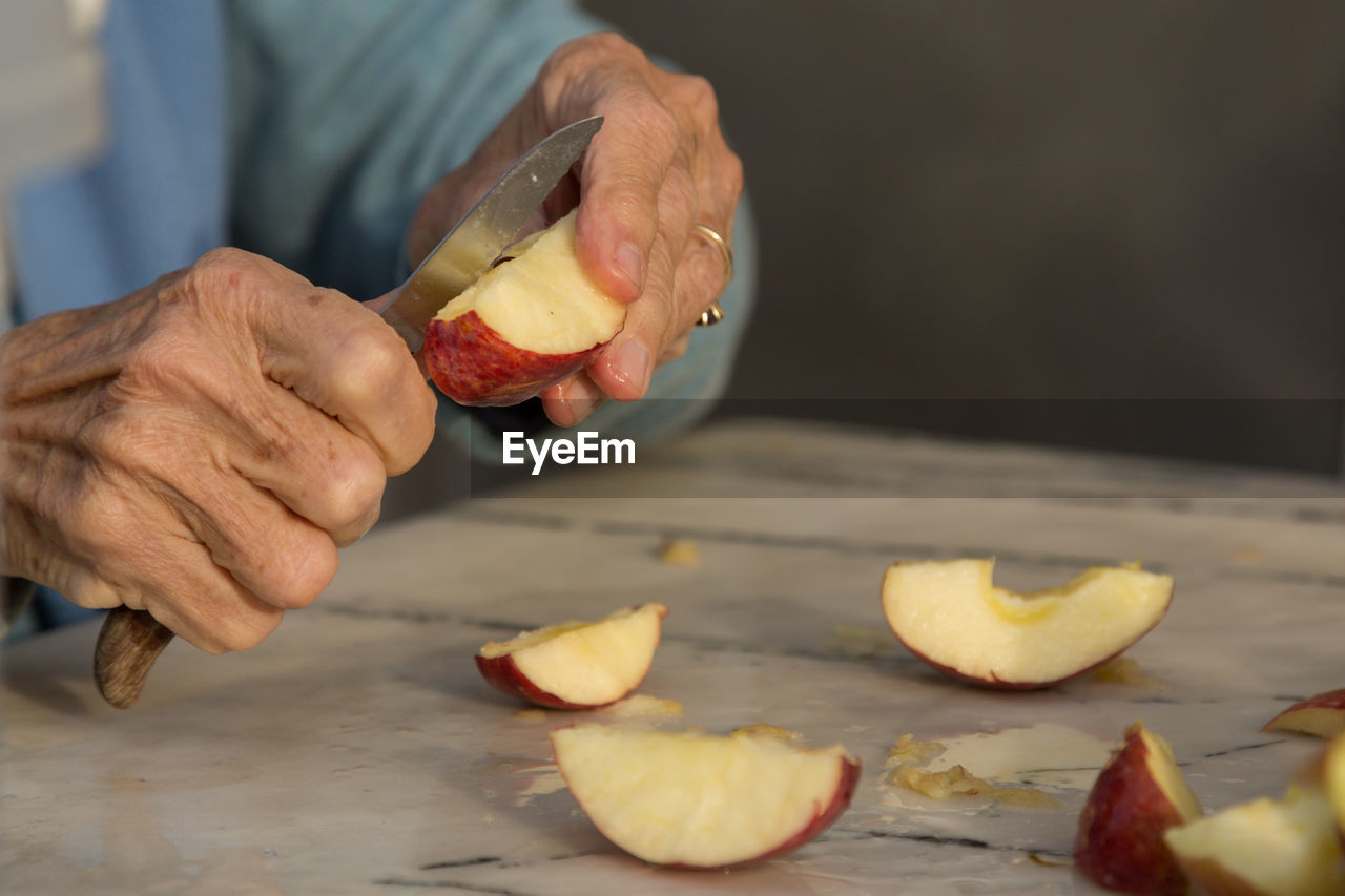 Close-up of person preparing food