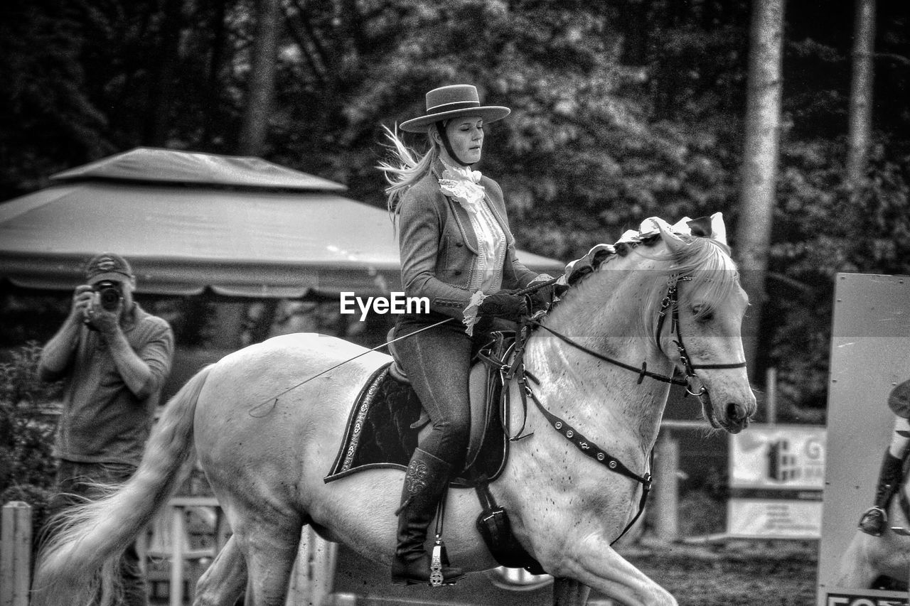 Woman riding horse