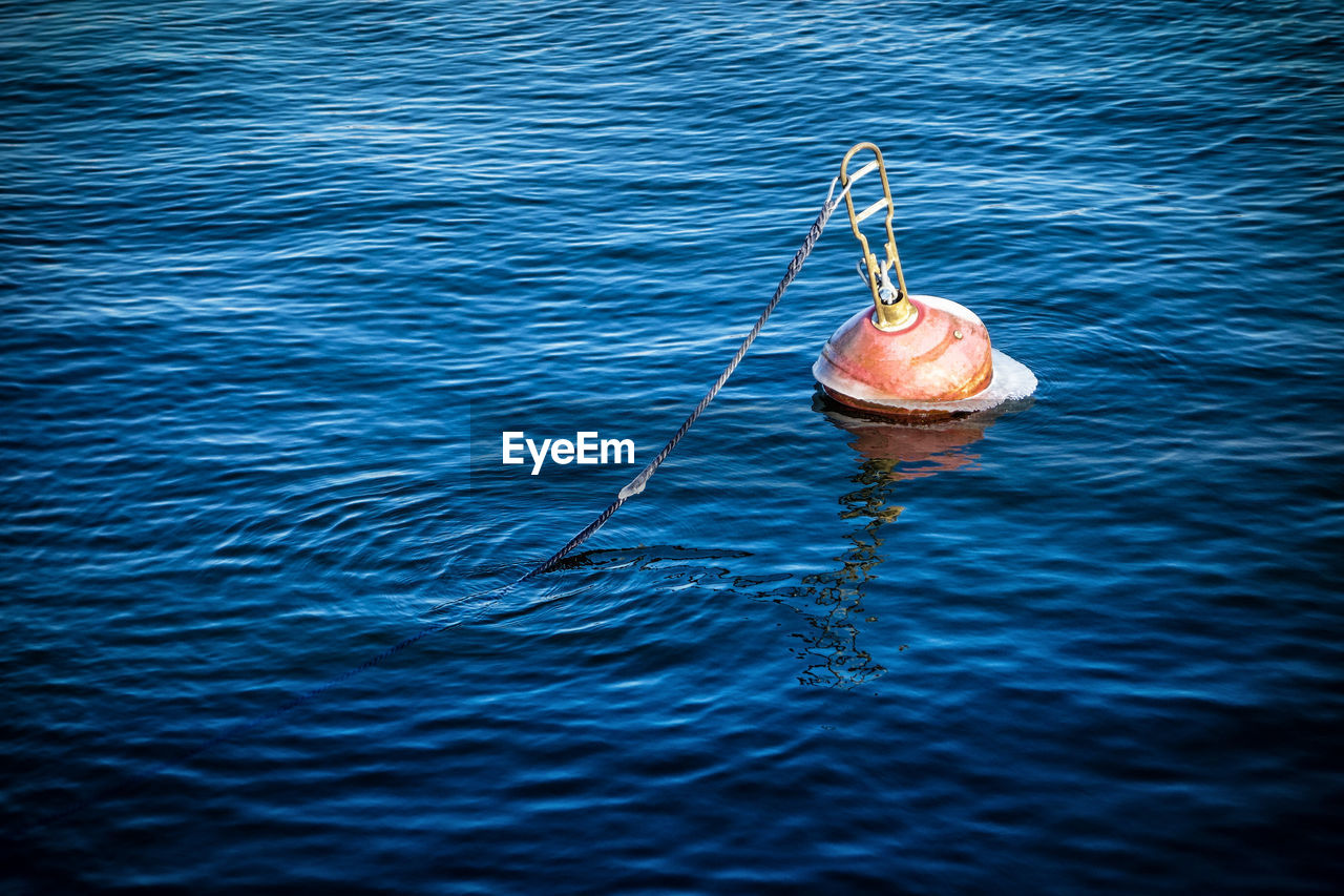 High angle view of buoy in sea