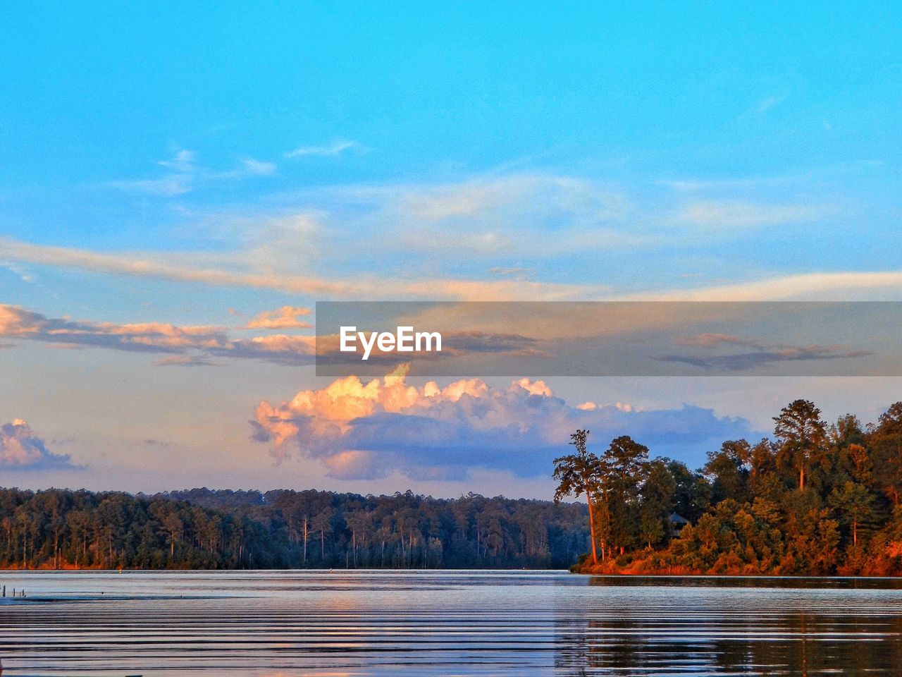 Scenic view of landscape against cloudy sky