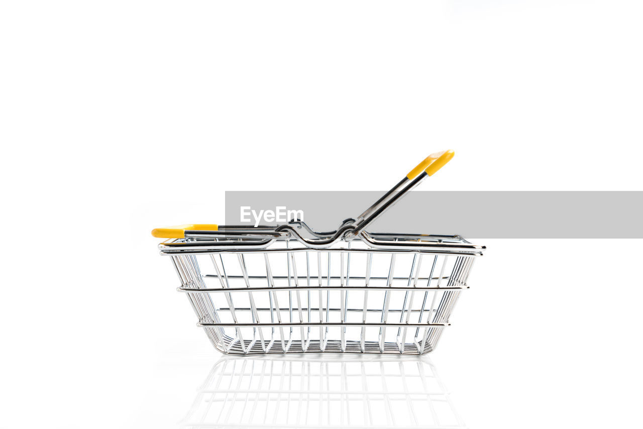 Shopping basket on isolated white background