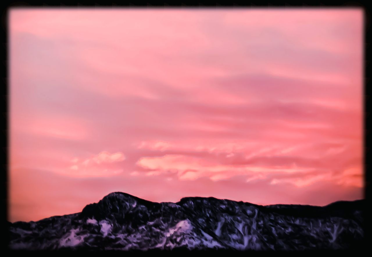 SCENIC VIEW OF MOUNTAINS AT NIGHT