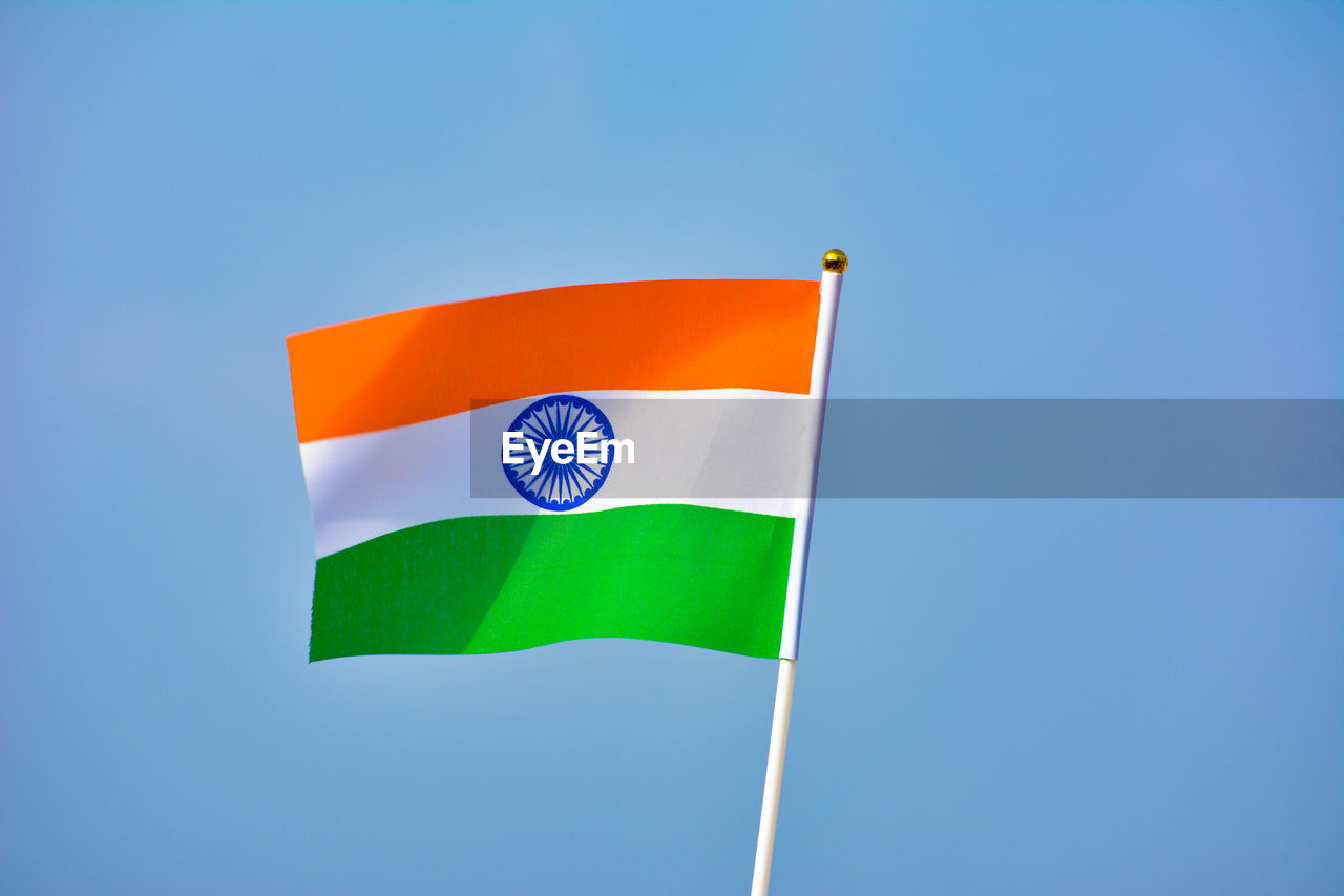 Indian flag against blue sky background