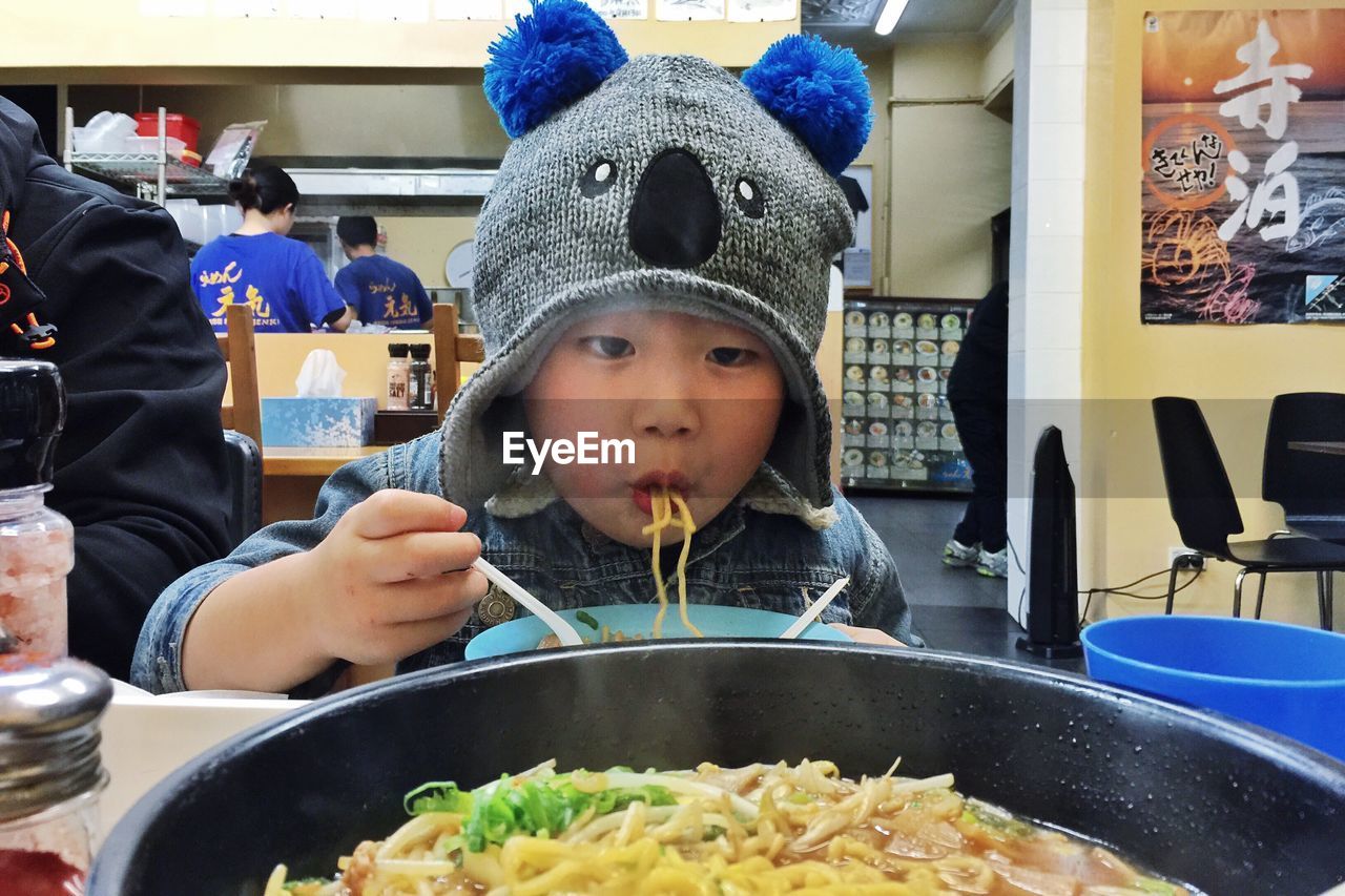 WOMAN EATING FOOD