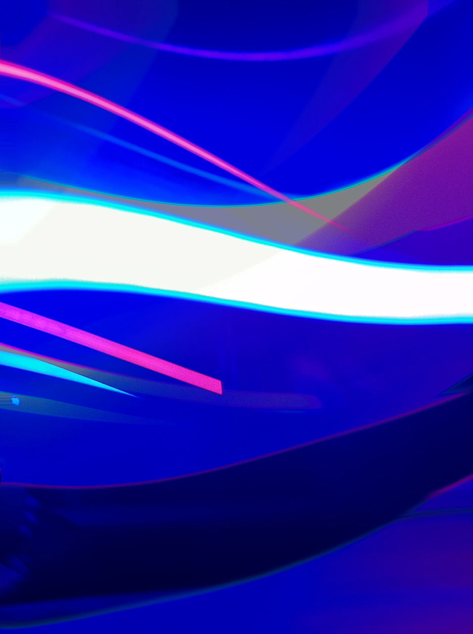 CLOSE-UP OF MULTI COLORED LIGHT PAINTING