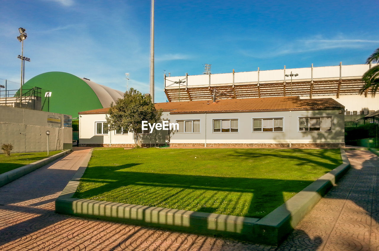 Built structure with lawn in foreground