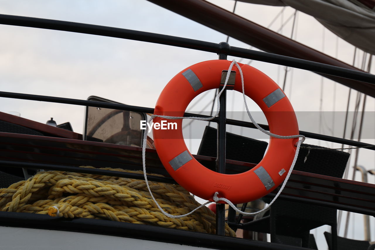 Low angle view of rope tied on boat
