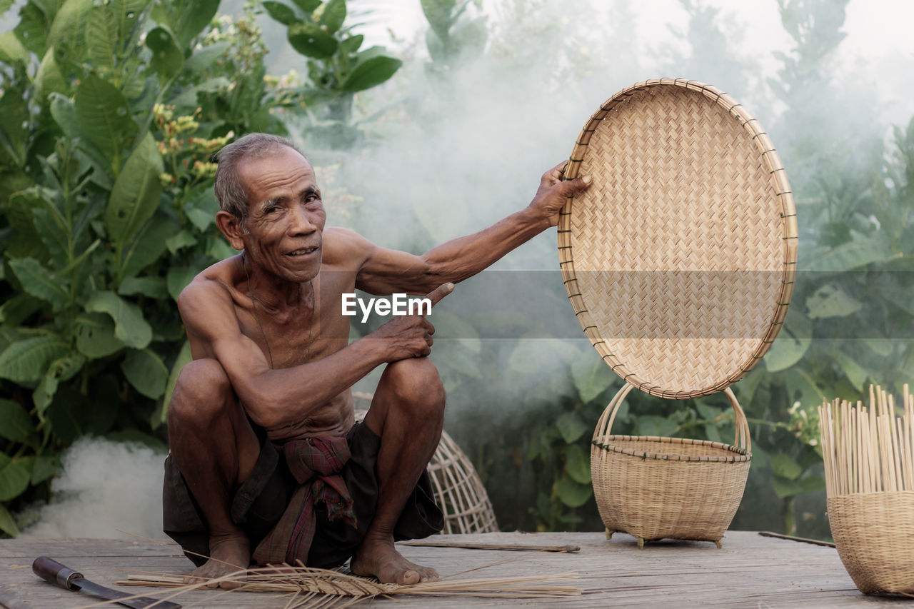 Woman sitting in basket