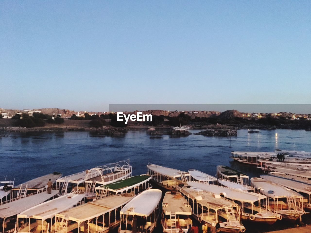 HIGH ANGLE VIEW OF RIVER AGAINST CLEAR SKY