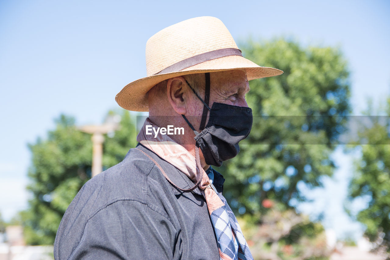 Senior adult man wearing face mask