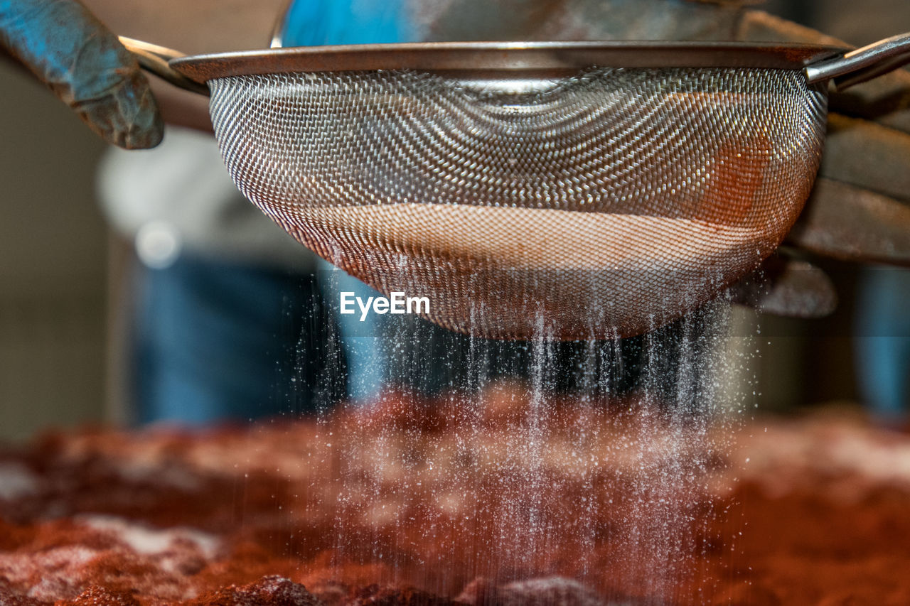 Close-up of person preparing food