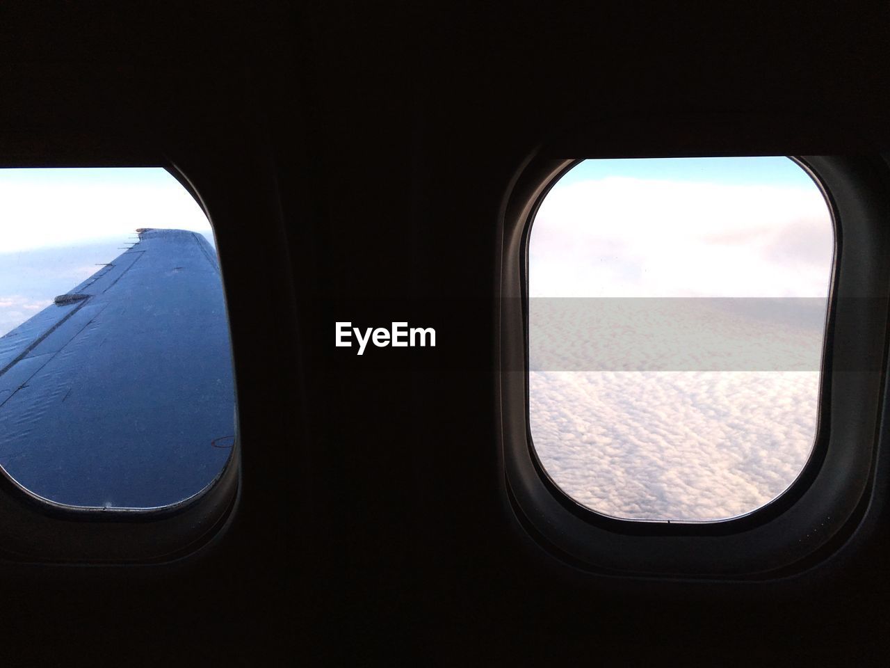 Idyllic view of cloudscape seen from airplane window