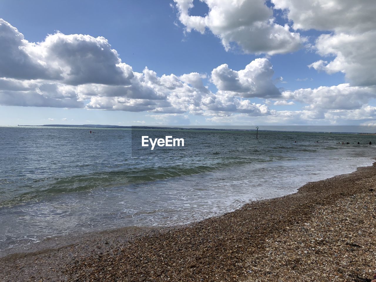 VIEW OF BEACH AGAINST SKY