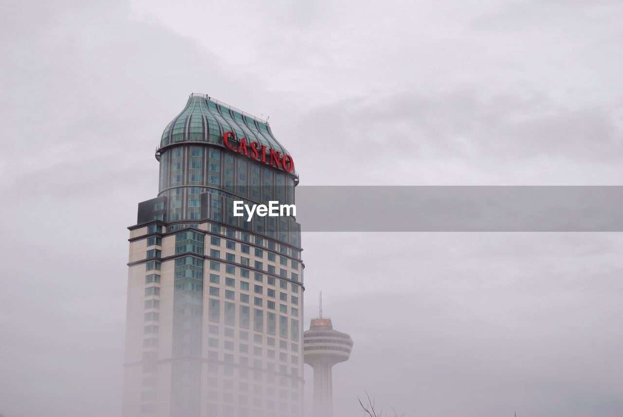 LOW ANGLE VIEW OF TOWER AGAINST SKY