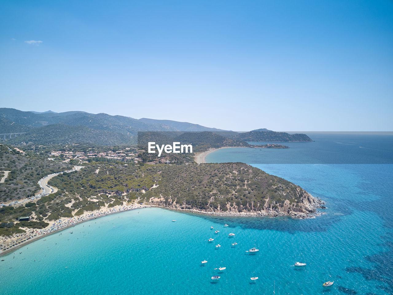 SCENIC VIEW OF BAY AGAINST CLEAR SKY