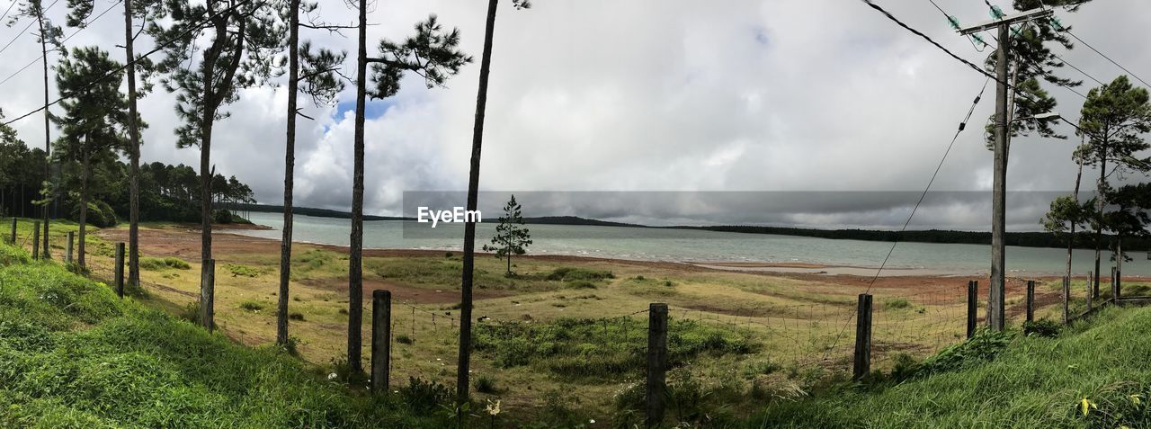 PANORAMIC SHOT OF BEACH AGAINST SKY