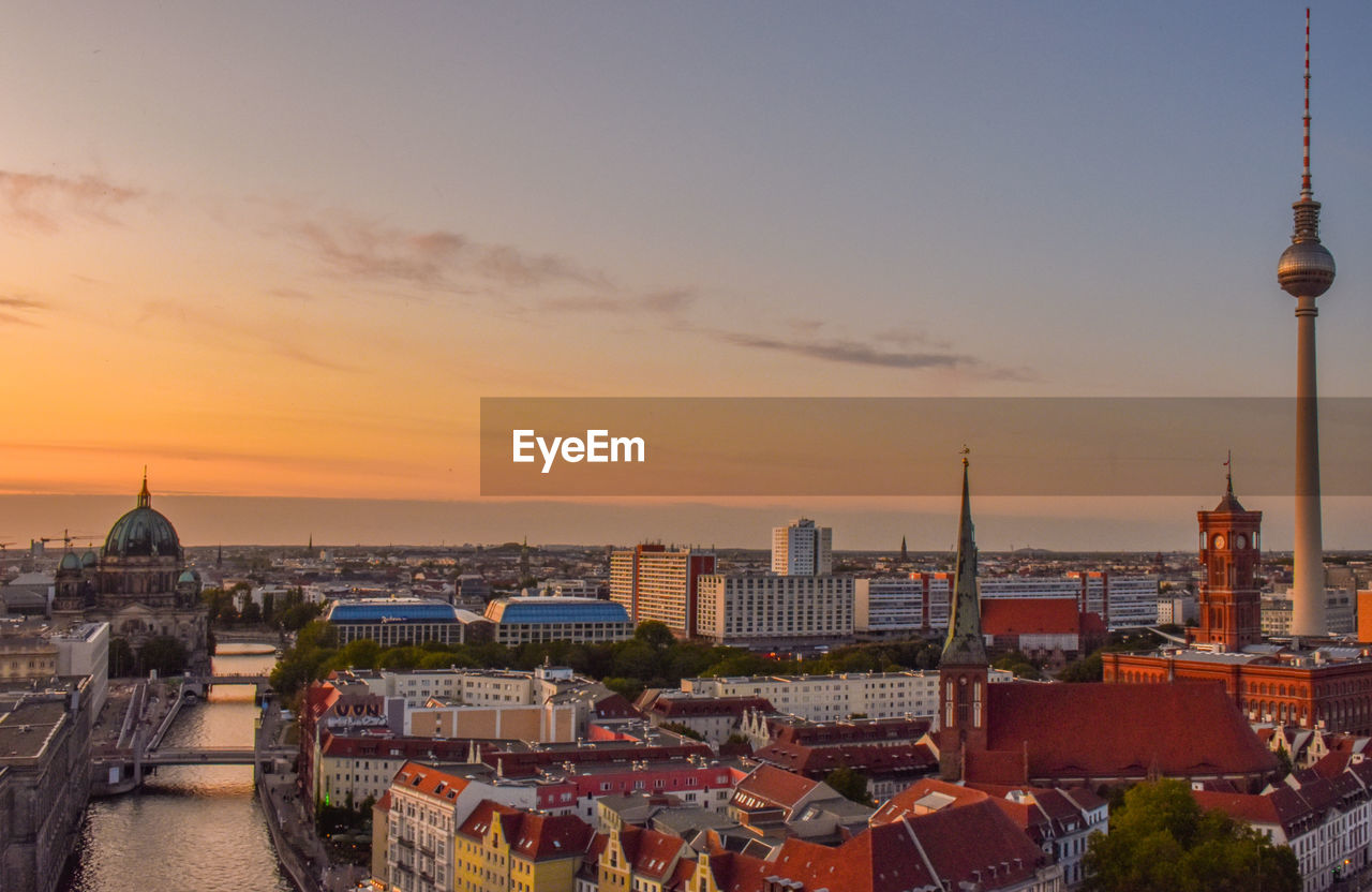 HIGH ANGLE VIEW OF CITY BUILDINGS DURING SUNSET